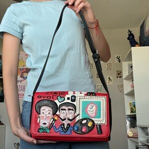 Braccialini designer red Flap bag with cartoon style Salvador Dali